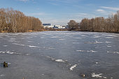 KYIV, UKRAINE - JANUARY 31, 2024: Warm weather and sunshine on the last day of January. the frozen ice begins to melt little by little because the weather is warm