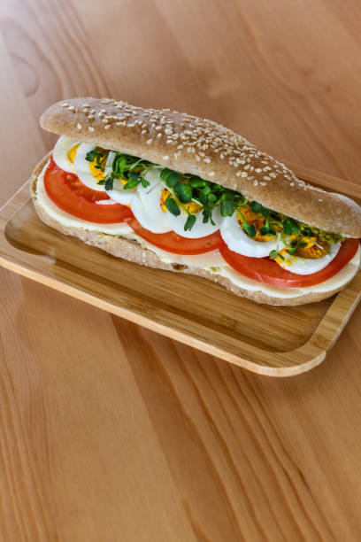 istock View Of Egg Sandwich Placed On A Wooden Plate 1975222787