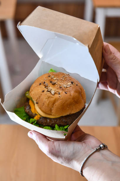 istock Open Box Of Takeaway Cheeseburger 1975231566
