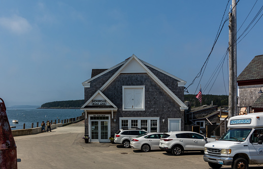 Port Clyde, ME USA - July 7, 2023:  Monhegan Boat Line Office and Sea Star Shop on a clear sunny summer day
