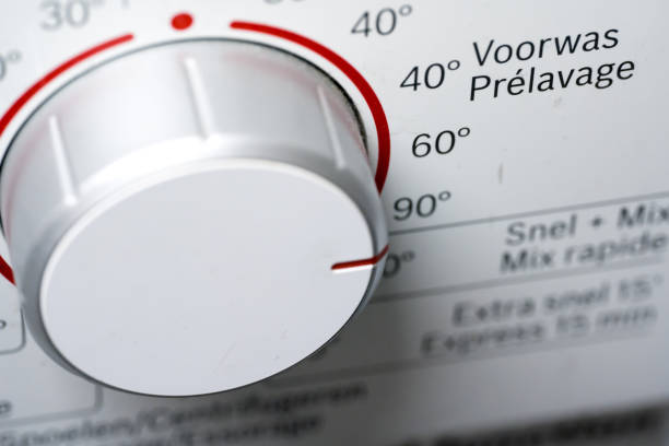 This captivating photo highlights a washing machine set to a remarkable temperature of 90 degrees. The intensity of the heat suggests deep cleaning and optimal hygiene. A intriguing snapshot of everyday life where technology and home comfort intersect.