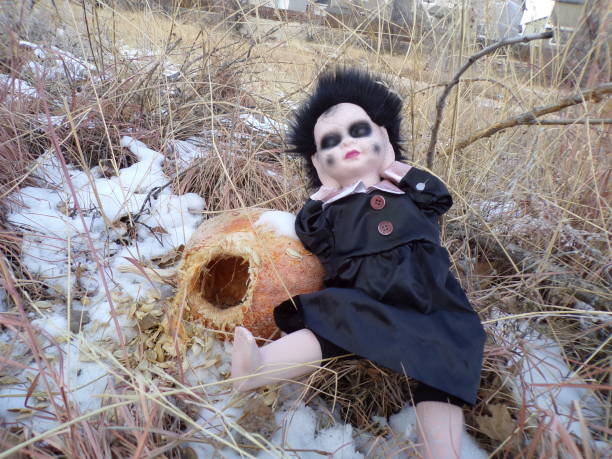 istock Scary Doll with Rotting Pumpkin 1975277569