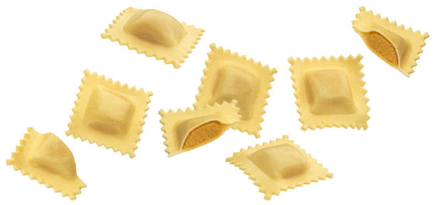 istock Ravioli pasta with pumpkin filling isolated on white background 1975282939