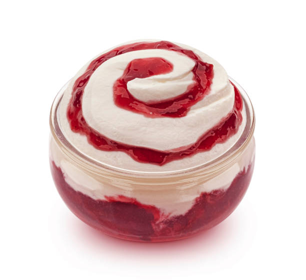 istock Yogurt with red berry jam isolated on white background 1975282968