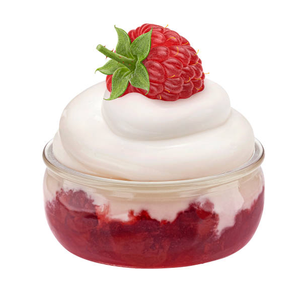 istock Glass jar of yogurt with raspberry jam isolated on white background 1975282977