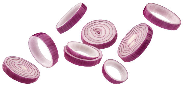 istock Red onion rings isolated on white background 1975283495