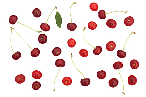 cherries fall scattered isolate on a white background, fruits