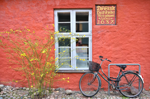 Stralsund, Germany - April 14, 2023: Bicycle at street. Typical architecture at old town of Stralsund. The historic Stralsund old town island is a UNESCO World Heritage Site