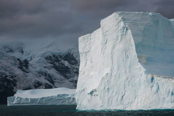istock Antarctica Peninsula Icebergs Drifting in Antarctic Ocean 1975324028