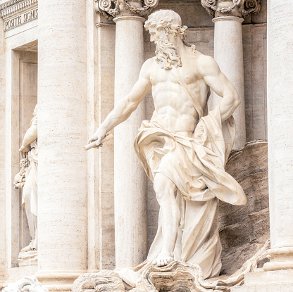 A full length image of the statue of the Greek God Oceanus, the centrepiece of the Trevi Fountain in Rome, Italy.