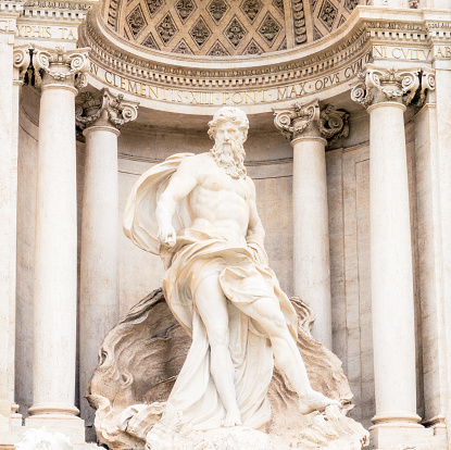 The 18th Century statue of the Greek God Oceanus, at the centre of the Trevi Fountain in Rome, Italy.