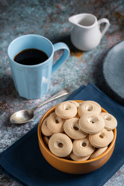 istock Coconut biscuit. Shortbread coconut cookies in bowl. 1975337784