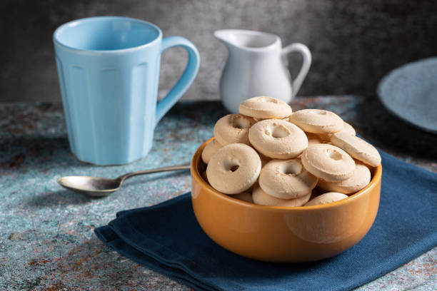 istock Coconut biscuit. Shortbread coconut cookies in bowl. 1975337846