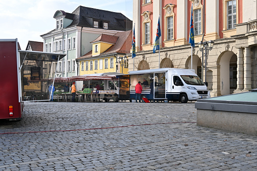 Bad Windsheim, Germany, January 25, 2024 - Weekly market on the historic town hall square in Bad Windsheim, Bavaria.