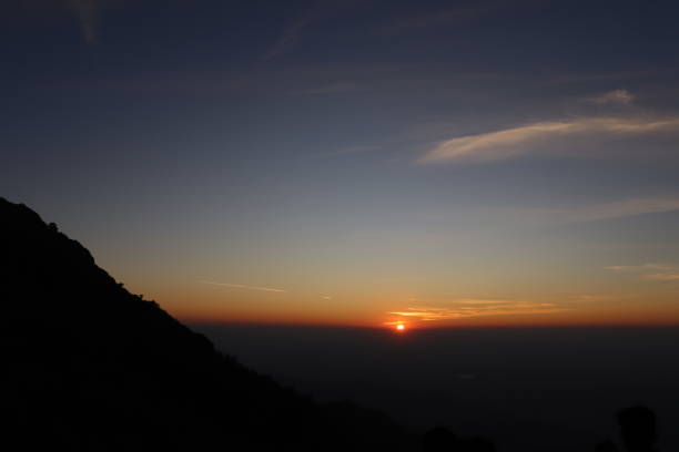 istock Sunset Point, Mount Abu. A Place Where Beautiful Sunset Is Seen With Blue Sky & Mountains. Sky & Clouds Photography During Sunset 1975351082