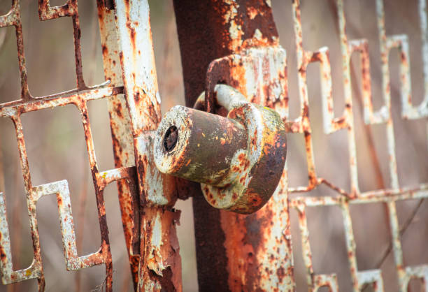 Old lock on a metal fence. Close-up.