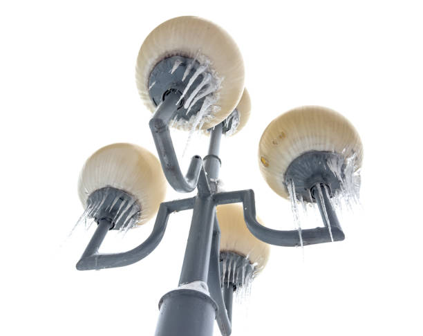Street lamp in icicles in winter.