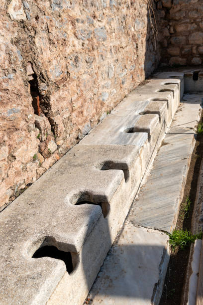 public toilets in ephesus ancient city - toilet public restroom ephesus history imagens e fotografias de stock