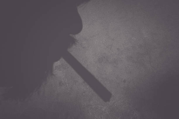 istock the shadow of an old man's face smoking 1975423984