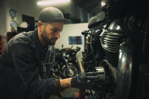 istock Mechanic working on a motorbike 1975463899