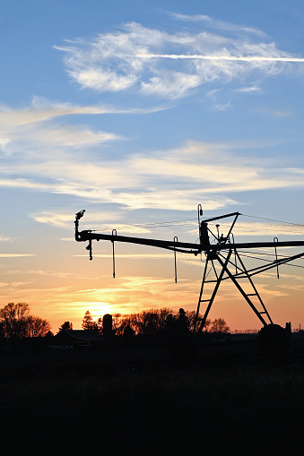 Silhouette of irrigation system in the winter.