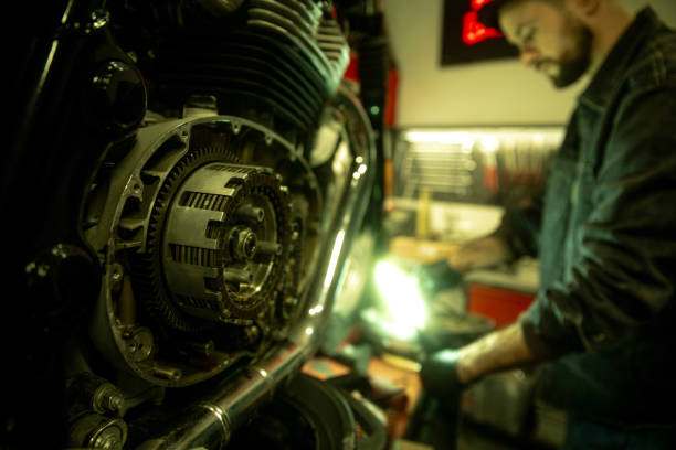 istock Mechanic working on a motorbike 1975481791