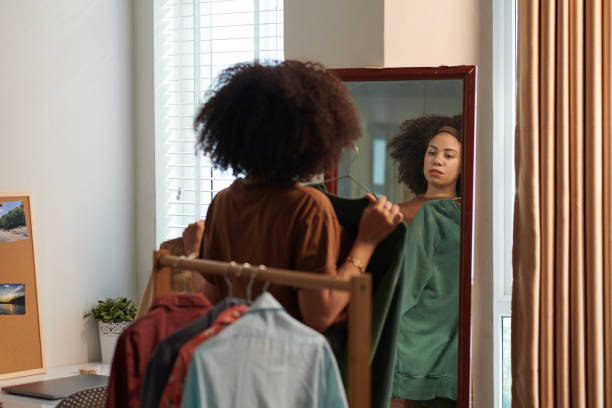 istock Woman Deciding What to Wear for Work 1975496948