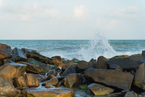 istock Rock bridge Breakwater Work for Wave Protection or Shoreline Beach Erosion Control. 1975496954