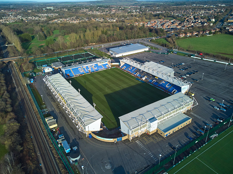 Aerial view of the Shrewsbury Town home football ground on the edge of Shrewsbury, UK