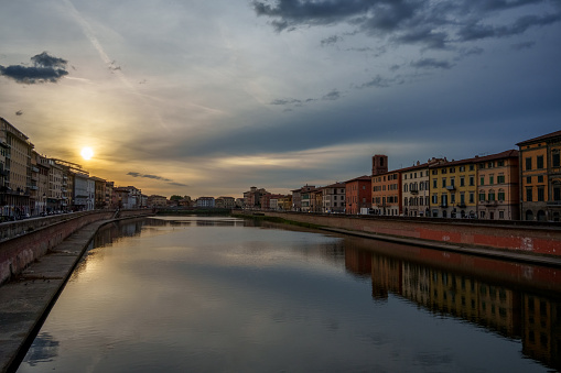 River Arno lined with Santa Maria della Spina church and colorful buildings in the city of Pisa, Pisa, Tuscany, Italy, Europe