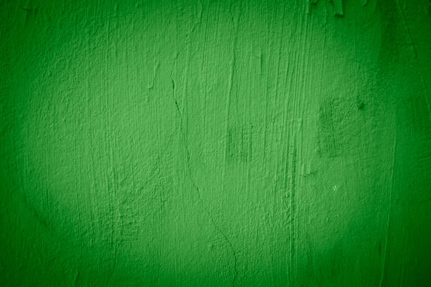 istock Green color background. Texture wall or abstract dark paint pattern. 1975575259