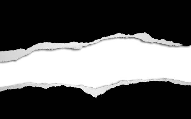 istock Gap in ripped black paper 1975639203