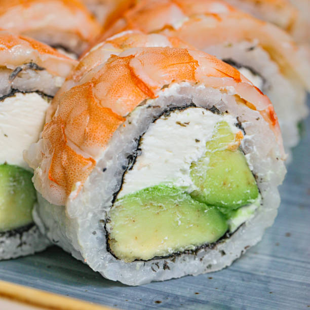 istock Close Up of Sushi Roll With Cucumbers 1975642913