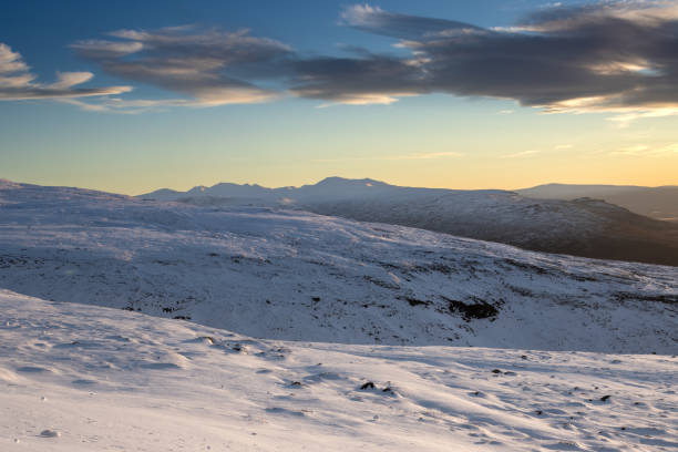 istock Snowy mountains during early sunset, Iceland 1975682014