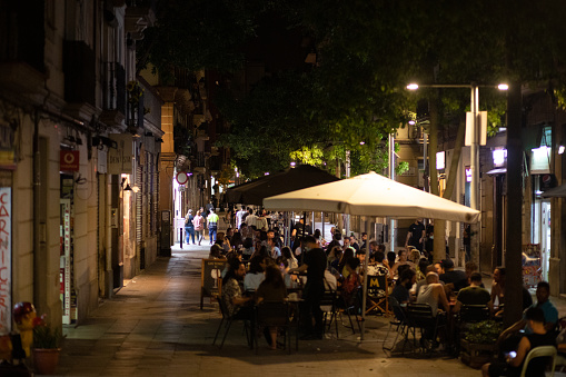 People gather in the streets of Barcelona late in the evening for some Pinchos, Beers, and a bit of socializing. Barcelona, Spain