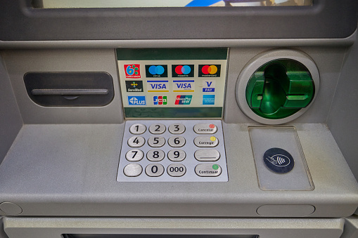 3d rendering of an ATM machine with its screen and button panel in a close view. Money and cash. Withdrawing your salary. Getting money from bank.