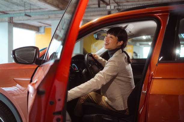 istock A Japanese woman getting in a car 1975774348