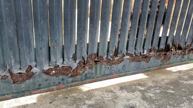 Rusty metal fence