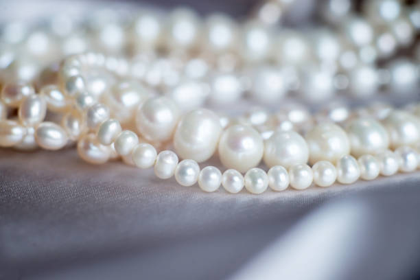 istock Luxury  necklace with pearl. Background, wealth 1975781228