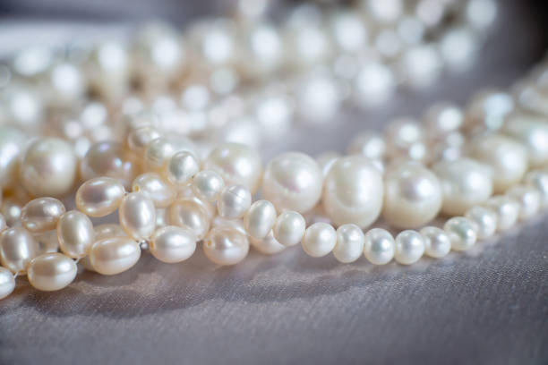 istock Luxury  necklace with pearl. Background, wealth 1975781232