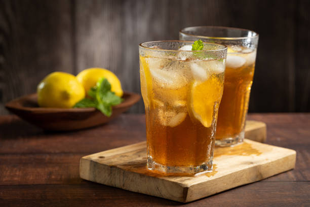 istock Glass of iced tea with lemon and mint. 1975791201