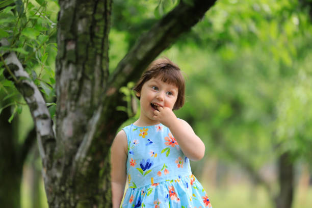 istock Tree and Cute Girl 1975839152
