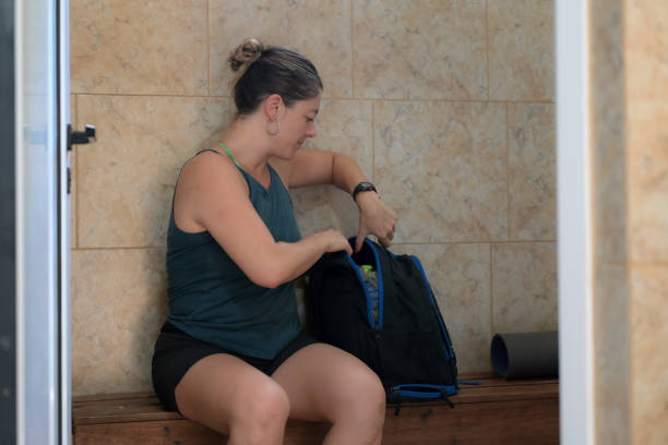 istock woman preparing to go swimming 1975842272