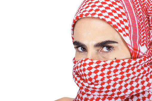 Woman with a Scarf Veiling her Face and a Striking Gaze
