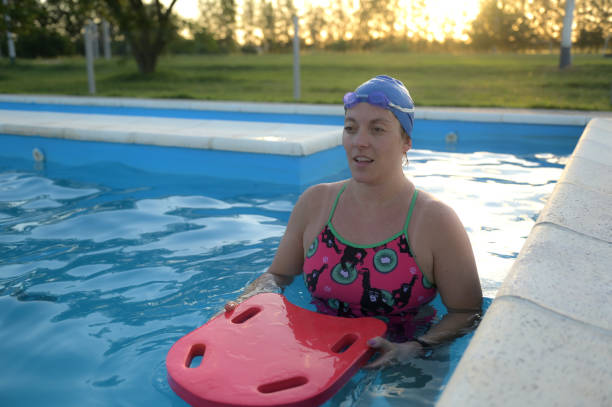 istock woman in the pool resting 1975849678