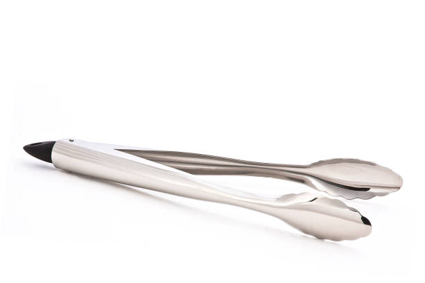 istock Metal kitchen tongs 1975885341
