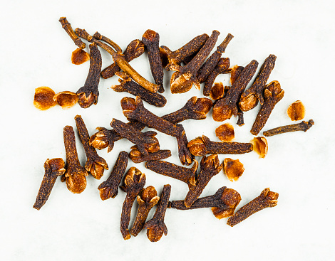 Overhead shot of spice cloves used fro cooking . Macrophotography made in studio.