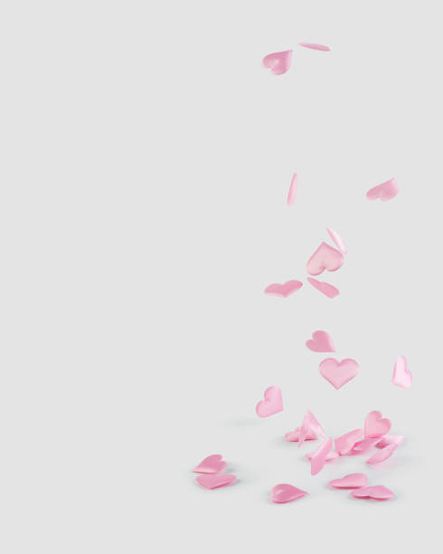 istock Pink hearts falling on a white background, levitation 1975958099