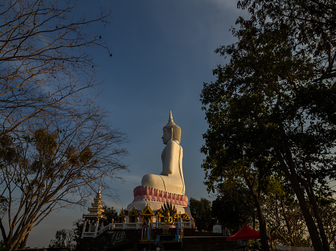 sunset at Wat Phra Bat Phu Pan Kham temple ,Ubonrat Dam ,Thailand