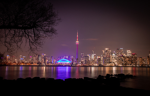 Downtown Toronto skyline view at night from Island.